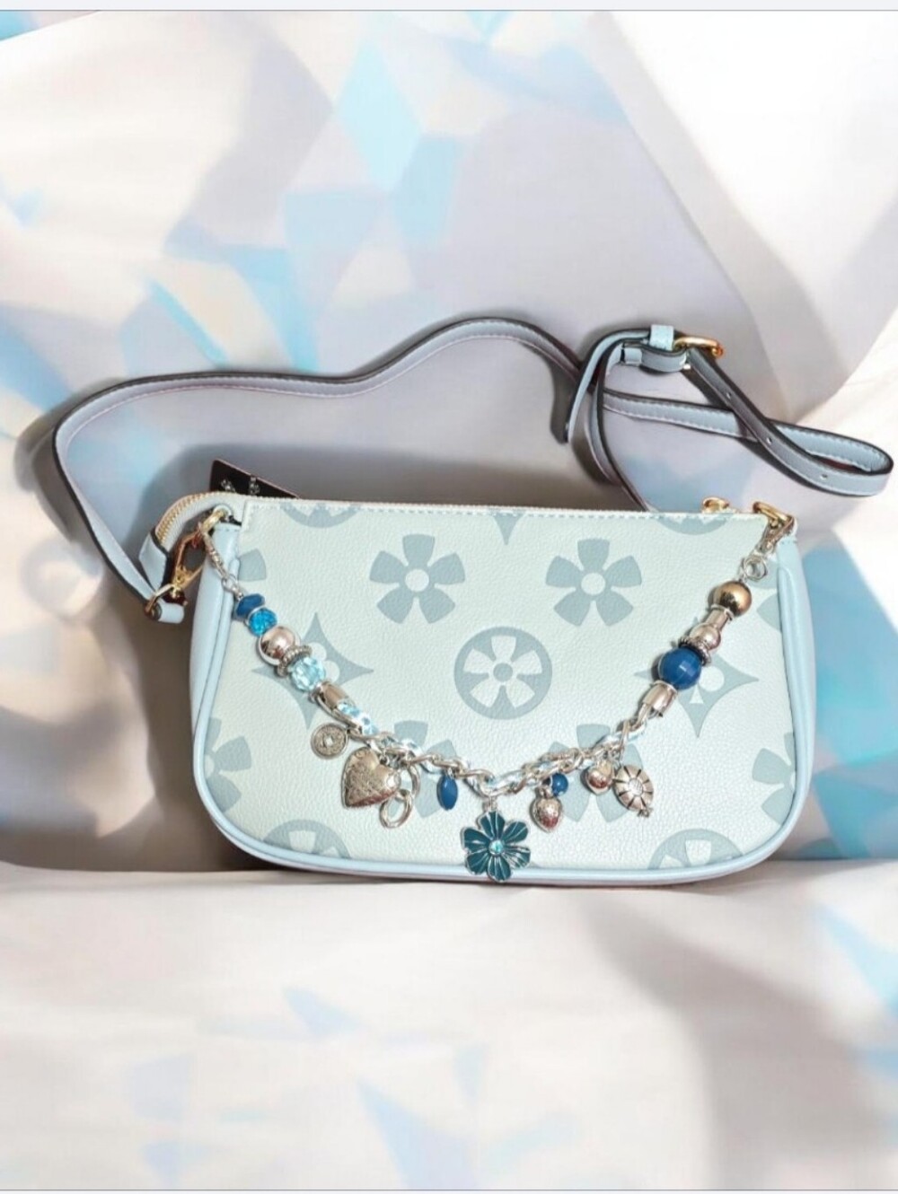 Light Blue Floral Charm Crossbody Bag .